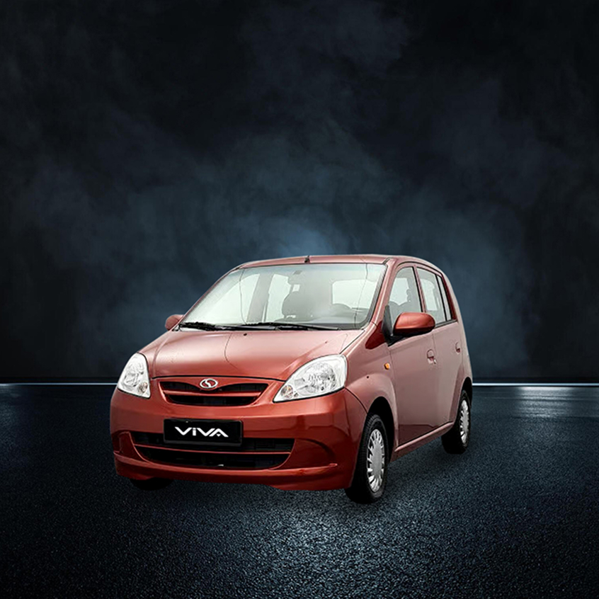 Red Perodua Viva compact hatchback car on a dark studio background, front-side view.