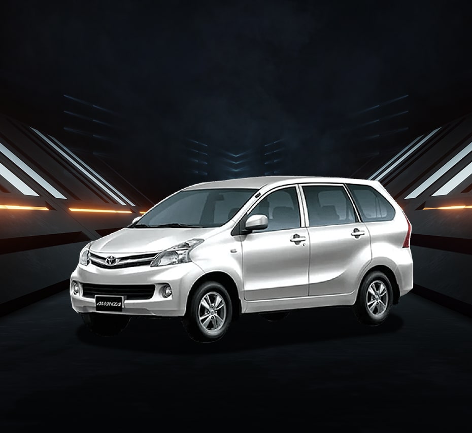 Silver Toyota Avanza MPV with compact design and alloy wheels, studio front-side view.