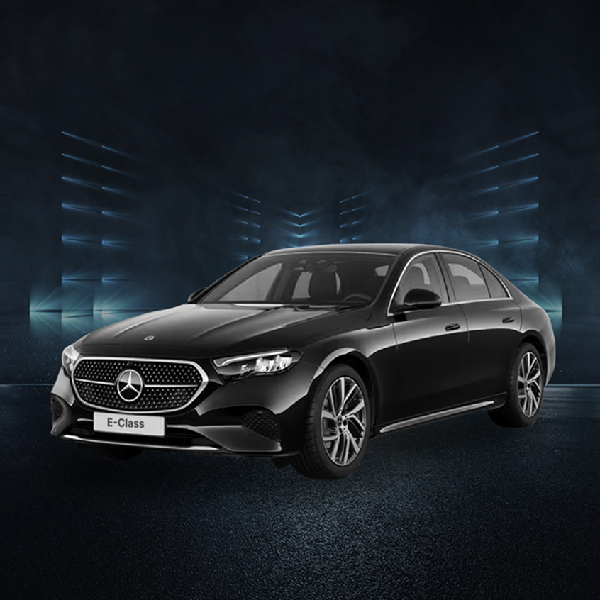 Black Mercedes-Benz E-Class luxury sedan in studio with dark futuristic background, front-side view.